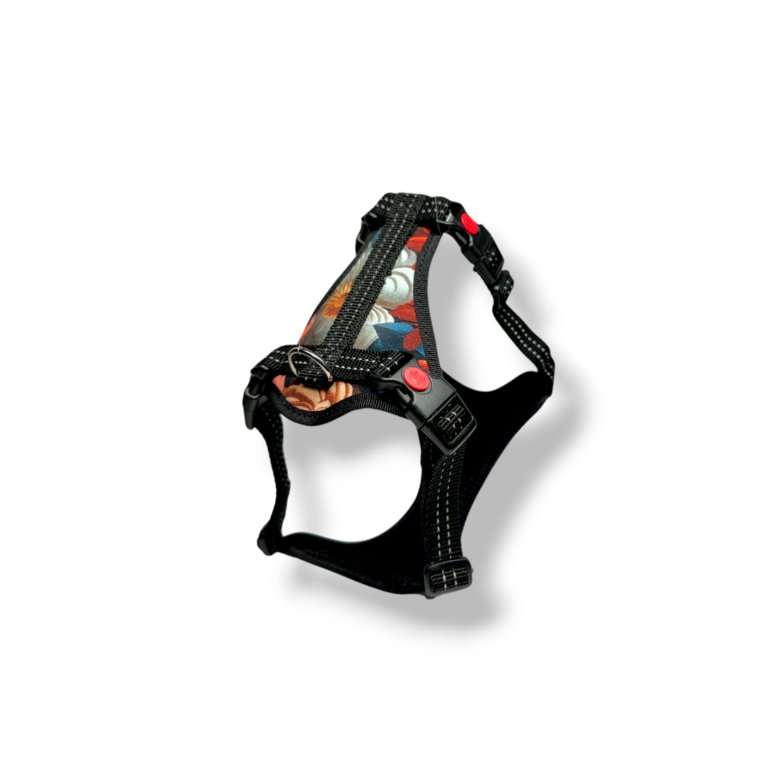 Black dog harness with colorful interior on a white background