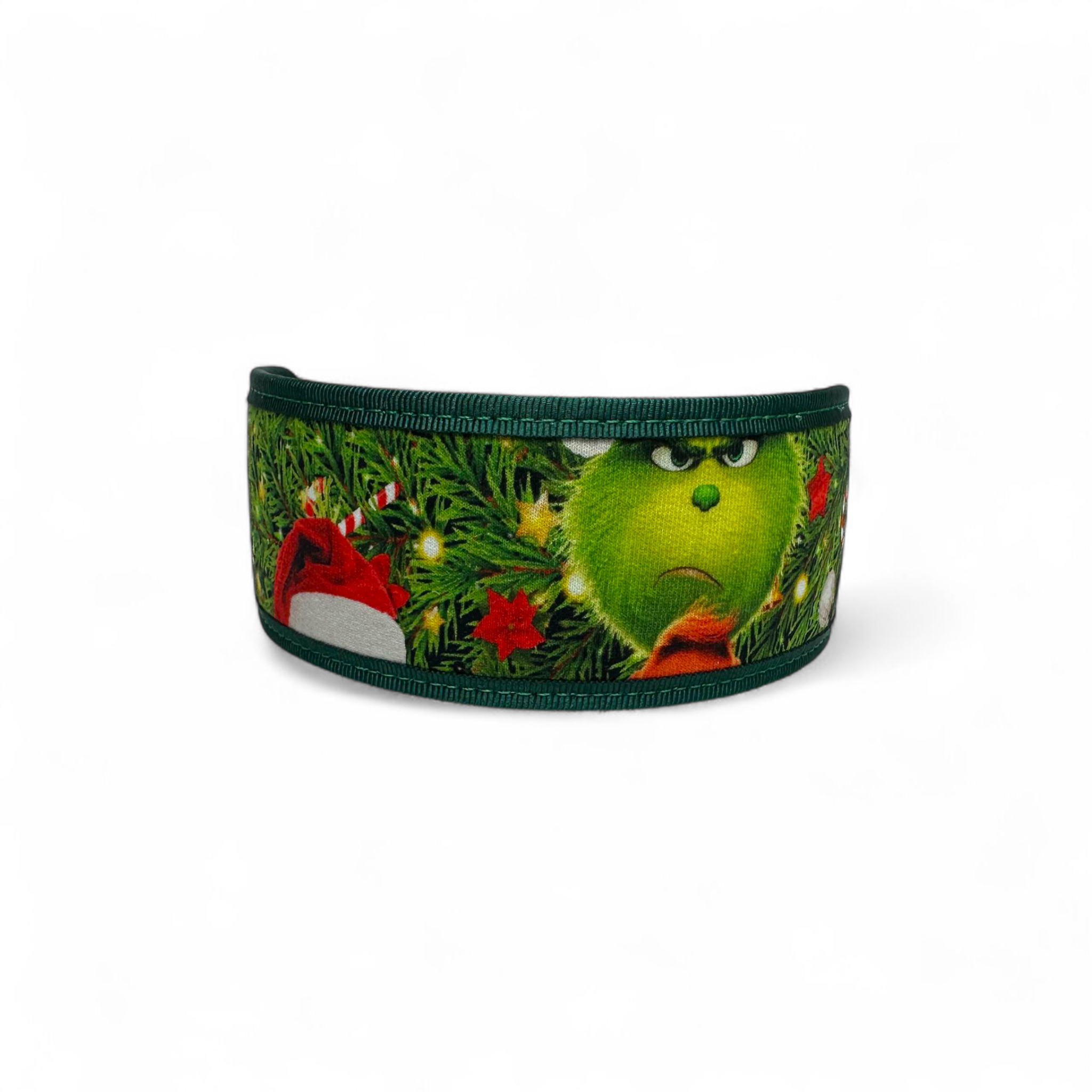 Wide green ribbon with a festive design featuring a green character and Christmas elements on a white background.