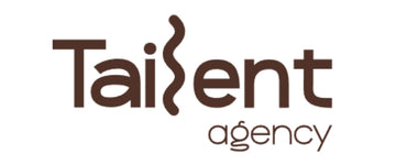 The logo for 'TaiLent agency' is displayed on a solid white background. The text features 'TaiLent' in a dark brown serif font with a stylized wave-like vertical stroke replacing the letter 'i' in 'Tai', and 'agency' written below in a lighter brown sans-serif font.